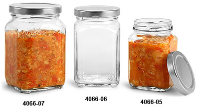 Самозалепваща се вертикална обвивка около машина за етикетиране с бутилка за масло